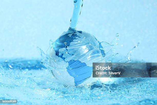 Glass Globe In Water Stock Photo - Download Image Now - Planet - Space, Splashing, Water