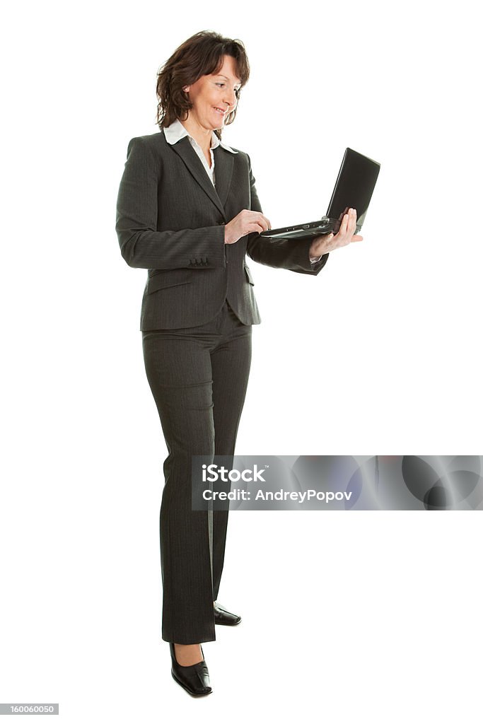 Starszy biznes kobieta za pomocą laptopa - Zbiór zdjęć royalty-free (Aktywni seniorzy)
