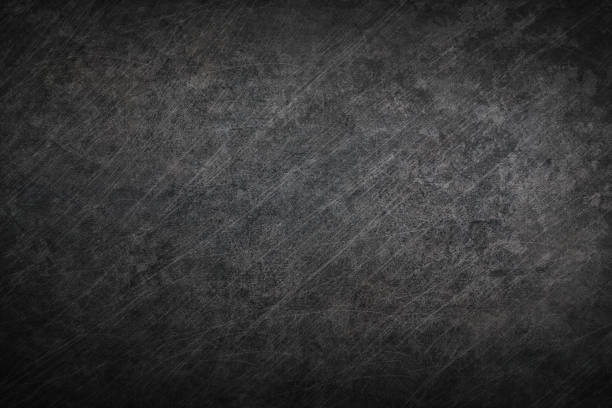 istock Texture of black concrete background. Dark wallpaper with rough cement texture. Decorative nature wall concept, surface mockup. Abstract grunge backdrop for art design. Top view, close up, copy space 1600605236