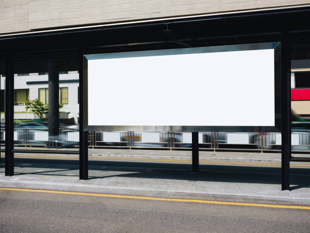 istock Blank white Banner Media Advertisement at Bus stop City street 1600611679