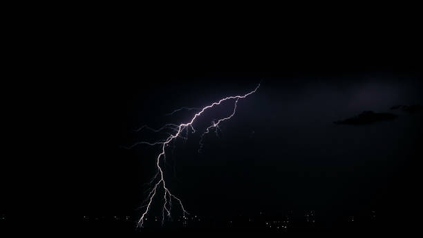 istock Night stormy sky over city. Beautiful lightning strike. Thundercloud 1600611977