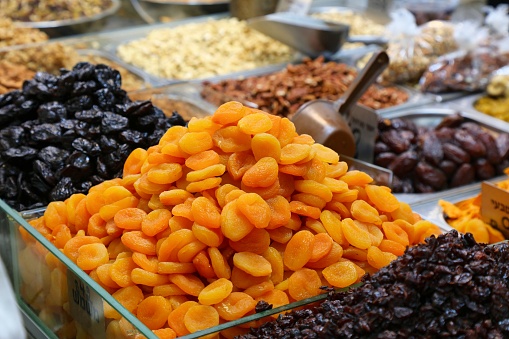 Dried apricot fruit and prunes. Israeli cuisine at Mahane Yehuda Market (or shuk) in Jerusalem.