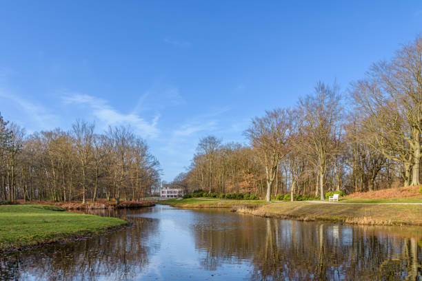 The mirror pond in the Leeuwenhorst nature reserve in Noordwijkerhout. In the background is the country house Dijckenburgh