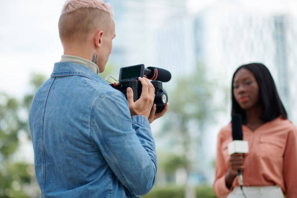 istock Cameraman Filming Journalist 1600708005