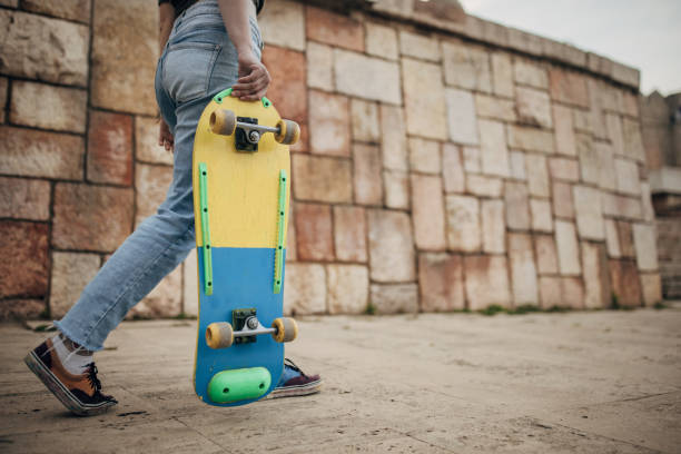 istock Young woman with skateboard 1600732690