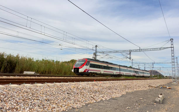 istock Train on railway. Spain regional commuter train in motion on railway. 1600735907