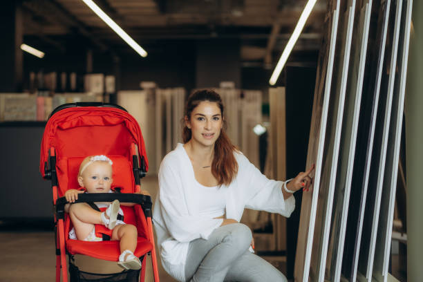 istock young mother chooses tiles for home 1600738082