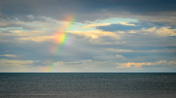 istock Rainbow over North Sea at Low Hauxley Beach 1600739792