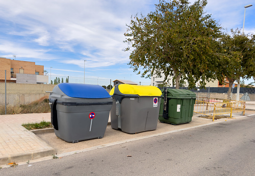 Large garbage containers on a garbage recycling center.