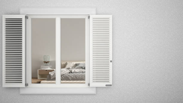 istock Exterior plaster wall with white window with shutters, showing interior bedroom with double bed, blank background with copy space, architecture design concept idea, mockup template 1600811573