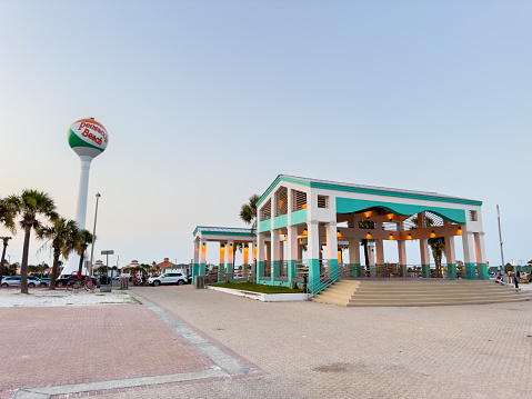 Pensacola Beach, FL, USA - July 21, 2023: Pensacola Beach bus stop pavilion and water tower