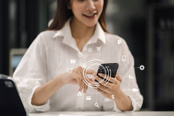 istock Female business is using a mobile phone in the morning. 1600848049