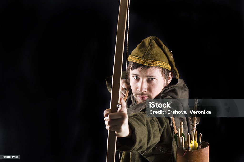 Medieval bowman Medieval bowman. Studio shot Aiming Stock Photo