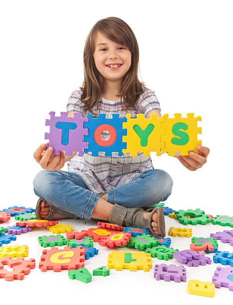 istock Happy child with letters 160085167