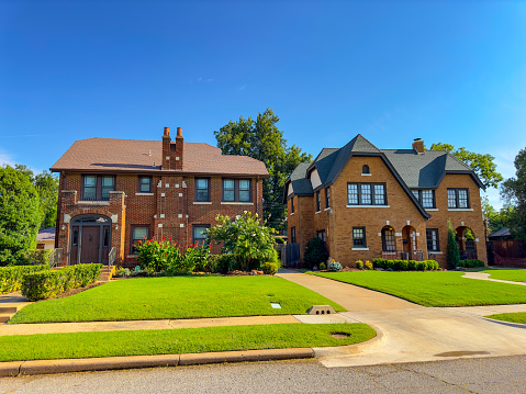 Large, traditional house in Ann Arbor, Michigan, USA on a sunny day.