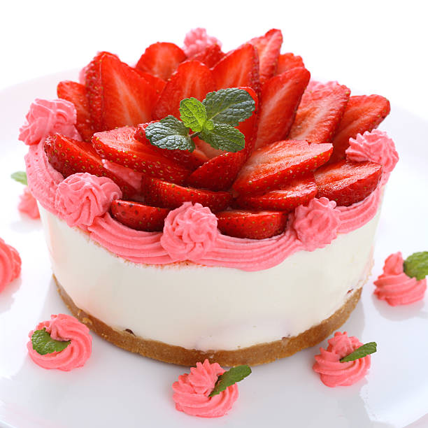 istock Cheesecake with fresh strawberries on white background 160085766