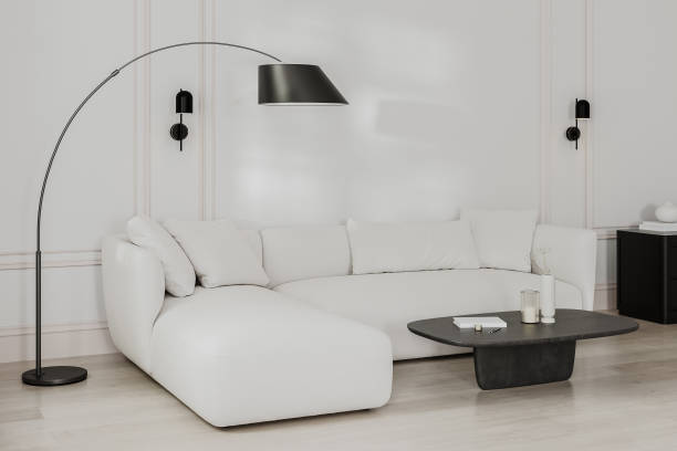 istock Living room interior with white corner sofa, floor lamp and table with decor, wall with moldings in french style, 3d rendering 1600859225