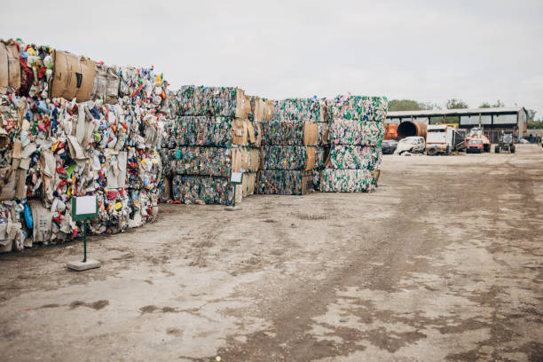 istock Recycling centre with plastic garbage piles ready to recycle 1600866653