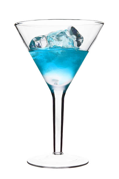 istock Blue Alcoholic Cocktail in martini glass with ice 160086990