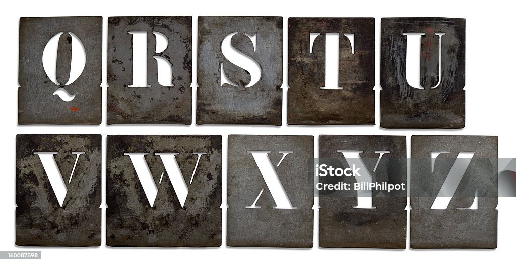 Antique metal stencils Rusting metal stencils forming part of alphabet on white background with clipping paths. Letter S Stock Photo