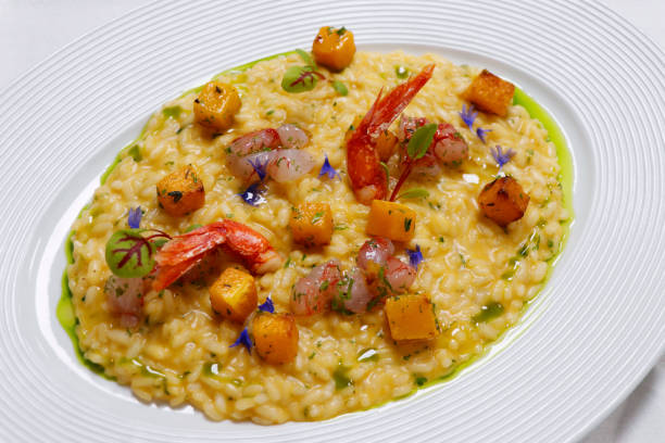 istock saffron and pumpkin risotto with red prawns ( gambero rosso) tartare 1600876208