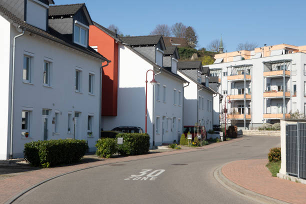 istock Empty road between houses and apartment buildings 1600884215