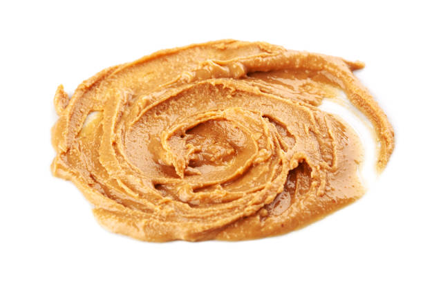 istock peanut butter swirl on white background isolated 1600889235