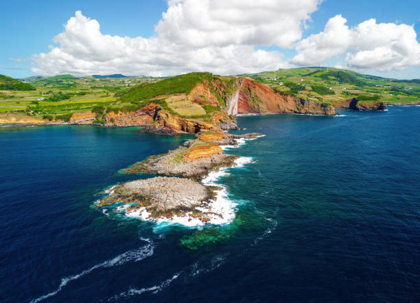 Contendas Islets in coastline of Terceira Island in Azores Contendas Islets in coastline of Terceira Island in Azores. Sea landscape of Azores. terceira azores stock pictures, royalty-free photos & images