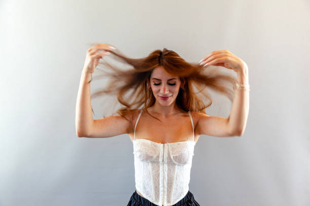 Woman playing with  hair