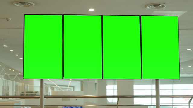 Green mock up blank billboard in airport terminal for advertisement