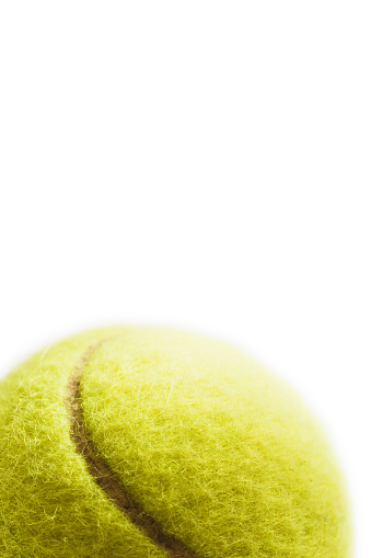 Tennis ball on white background with copyspace