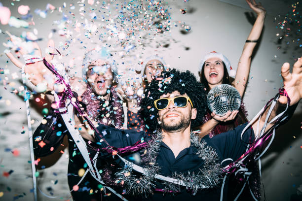 istock Happy friends celebrating midnight 1600927524