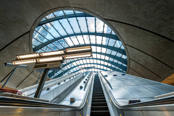 escalator in subway station at Canary Wharf, Docklands London UK stock photo