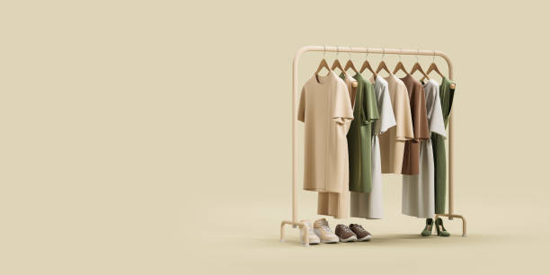 istock Rack with clothes and shoes over beige background 1600940744
