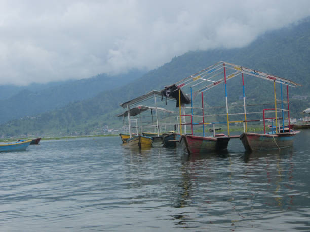 istock fishing boats on the lake 1600943145