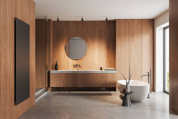 istock Light wooden bathroom interior with tub and sink 1600944865