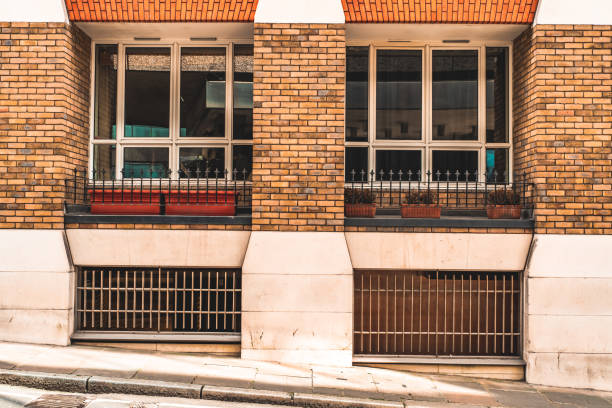 Window and gray facade of the house. Texture of fresh putty design