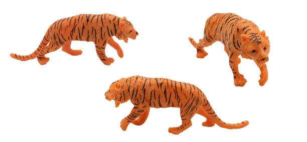 istock toy tigers on white background 1600964863