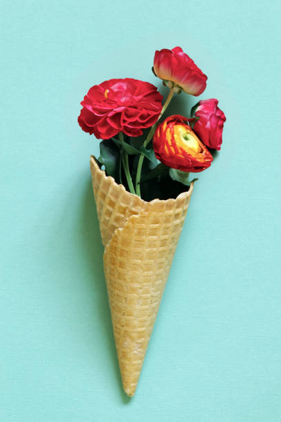 istock waffle cone with a bouquet of flowers 1600968154