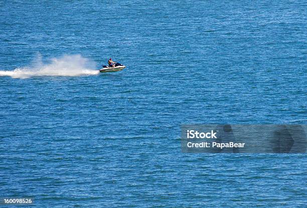 Flying Jetski Stock Photo - Download Image Now - Adult, Aquatic Sport, Blue