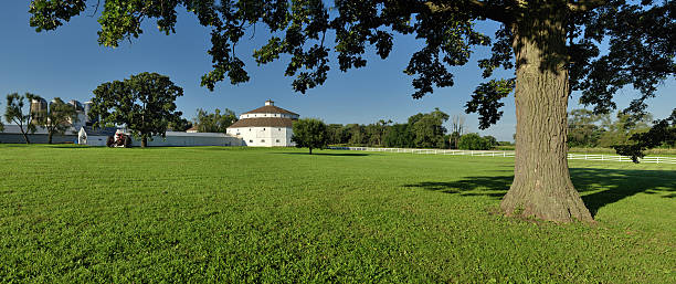 istock White Round Barn in Rural Landscape 160098710