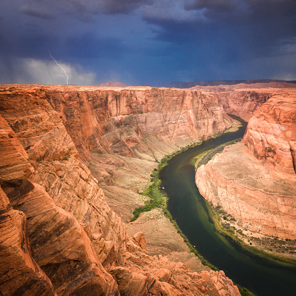 Lightning strikes the upper part of Horseshoe Bend near Page, AZ