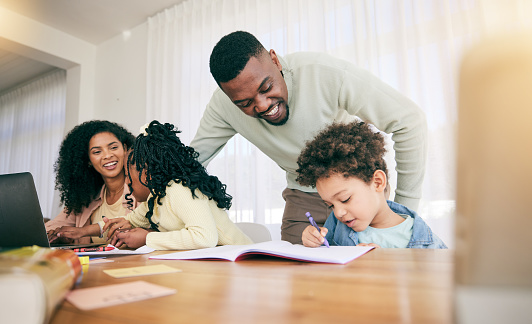 Writing, drawing and parents with children for homework, school activity and learning with notebooks. Black family, education and happy mom, dad and kids smile for teaching, lesson and help at home