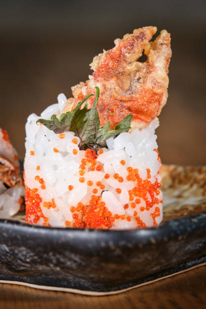 istock Exquisite sushi with tempura crab claw 1601009792