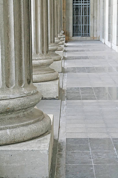 istock Law and order pillars outside a courthouse 160101440