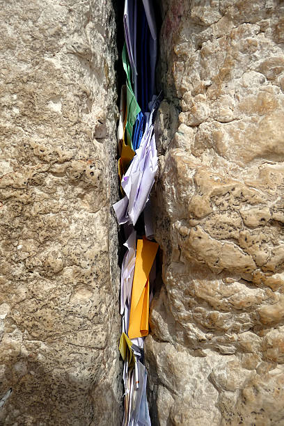 istock Slips of paper containing prayers in the Wailing Wall 160102827