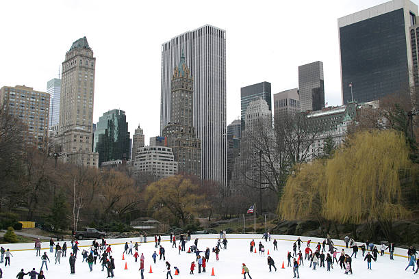 Winter Skaters in Central Park, New York USA stock photo