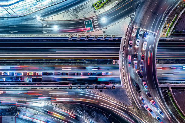 istock Expressway top view, Road traffic an important infrastructure, Drone aerial view fly in circle, traffic transportation, Public transport or commuter city life concept of economic and energ, transport 1601032369