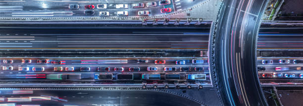 istock Expressway top view, Road traffic an important infrastructure, Drone aerial view fly in circle, traffic transportation, Public transport or commuter city life concept of economic and energ, transport 1601032374