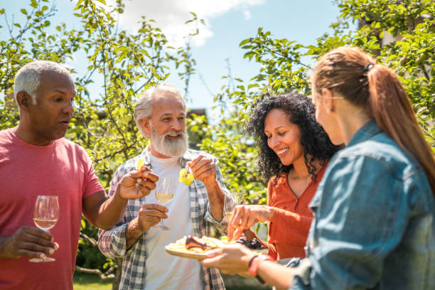 istock Cheerful Diverse Seniors Having Summer Picnic 1601037824